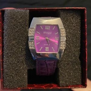 New watch in box with purple band